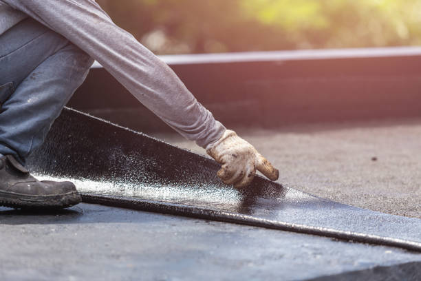 Professional Basement Waterproofing technician working in Manhasset, NY
